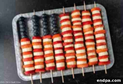 4th of July fruit kabobs with strawberries, blueberries, and bananas.