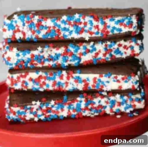 4th of July Ice Cream Sandwich with patriotic sprinkles on the sides.