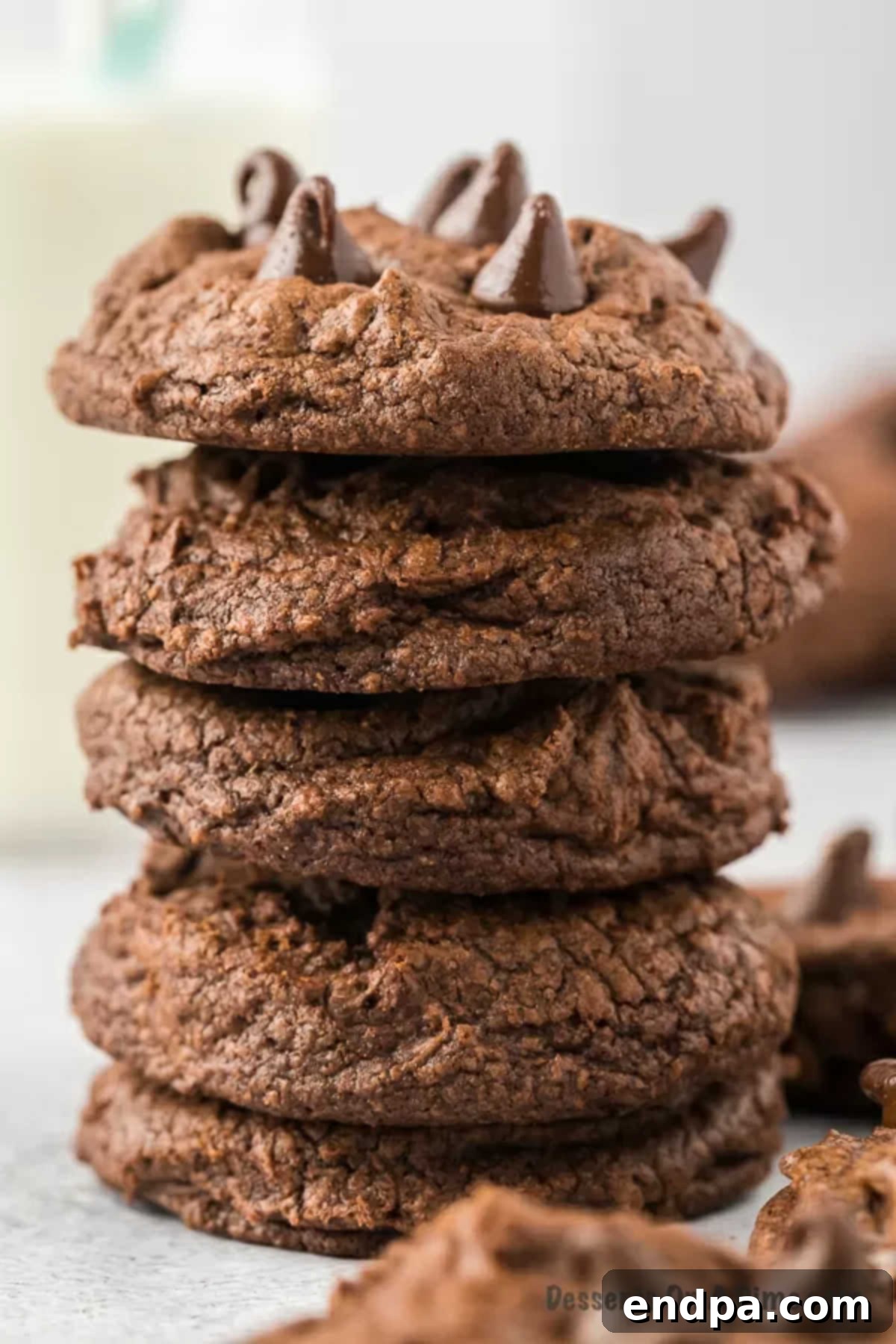 Stack of rich, fudgy brownie cookies, showcasing their inviting texture.