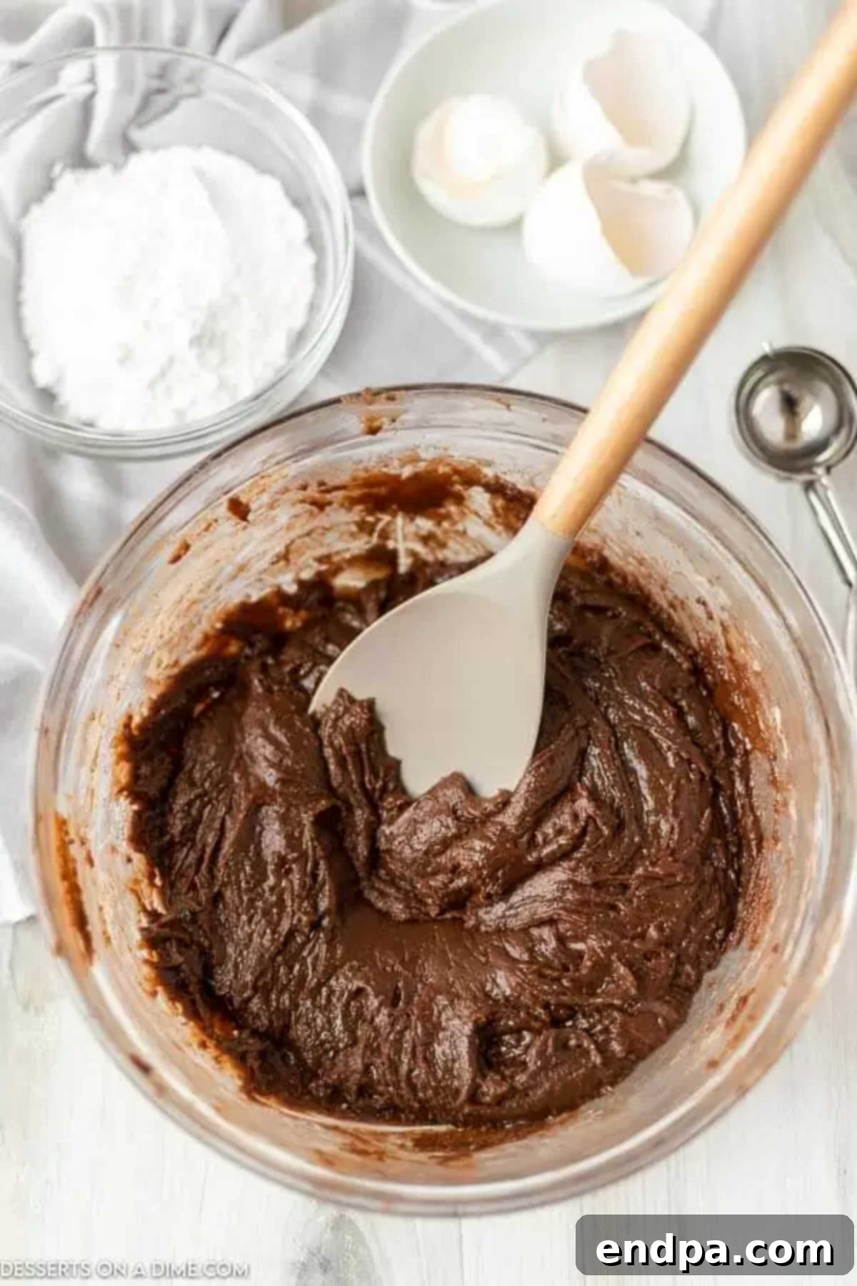 Bowl of brownie batter combined together.