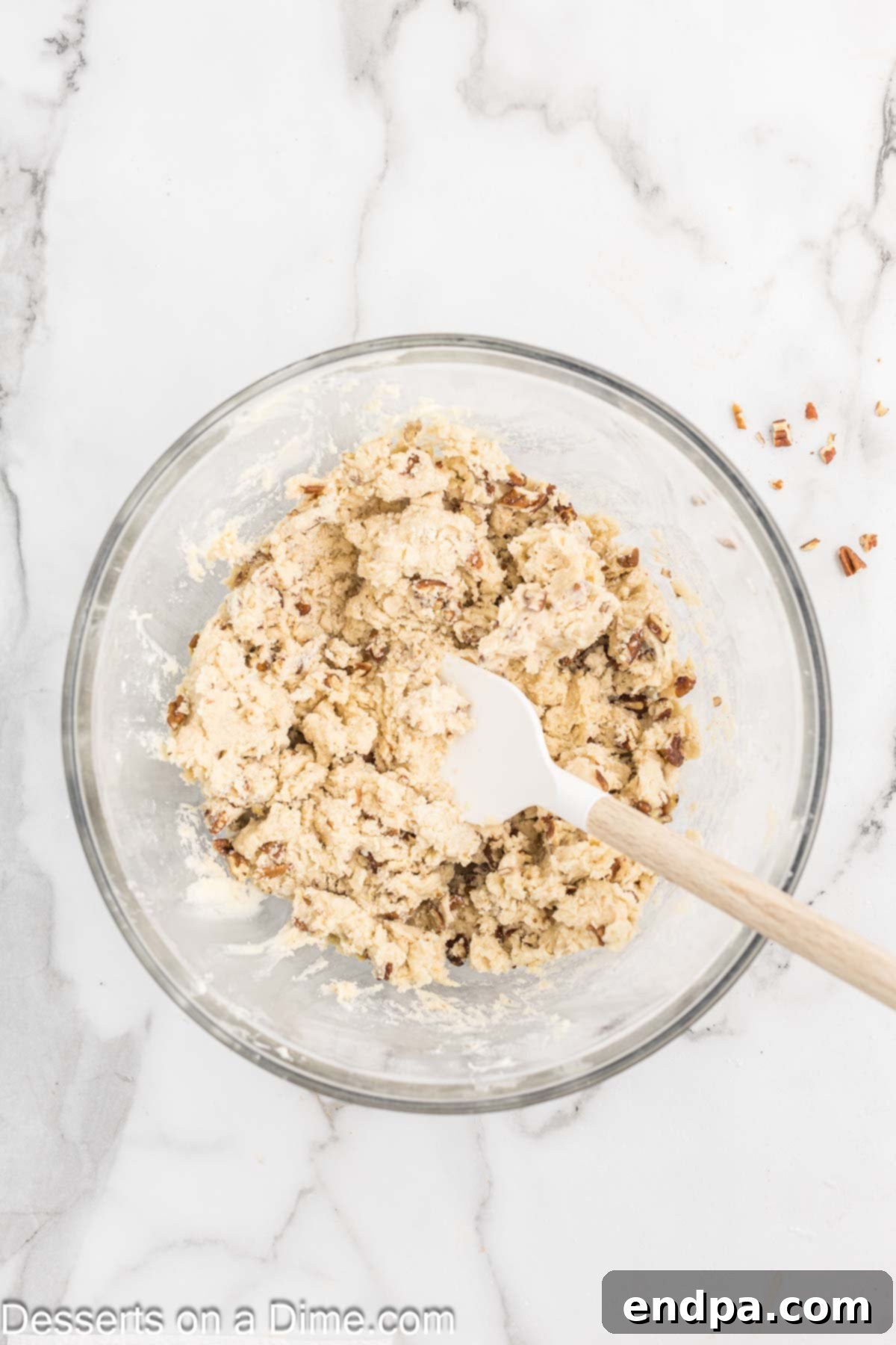 Powdered Sugar Dreams 7 Nuts folded into mixture.