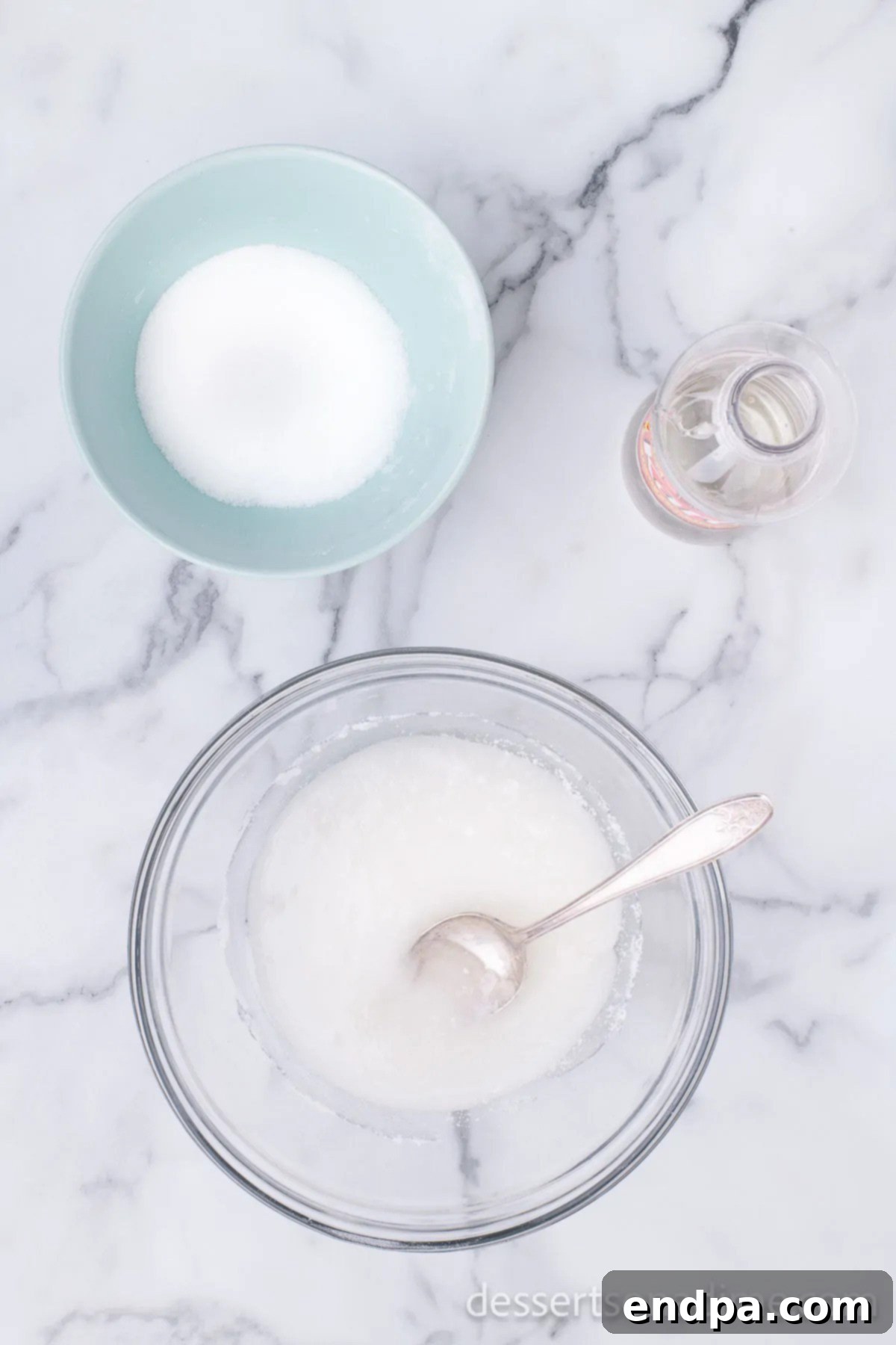 Mixing bowl with corn syrup and sugar, ready for microwaving.