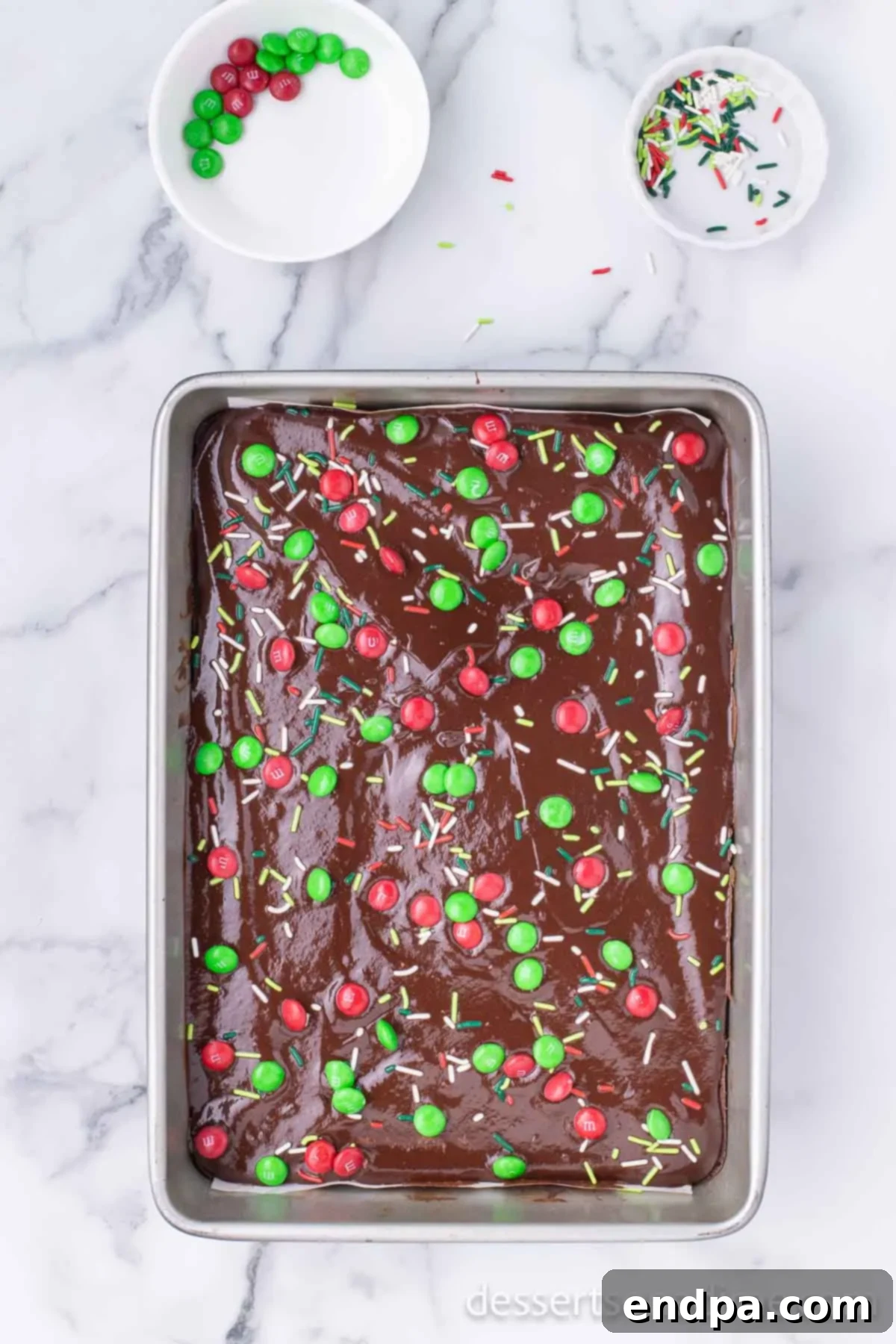 Merry & Bright Brownies 11 Festive sprinkles and M&Ms added on top of the ganache-covered brownies.