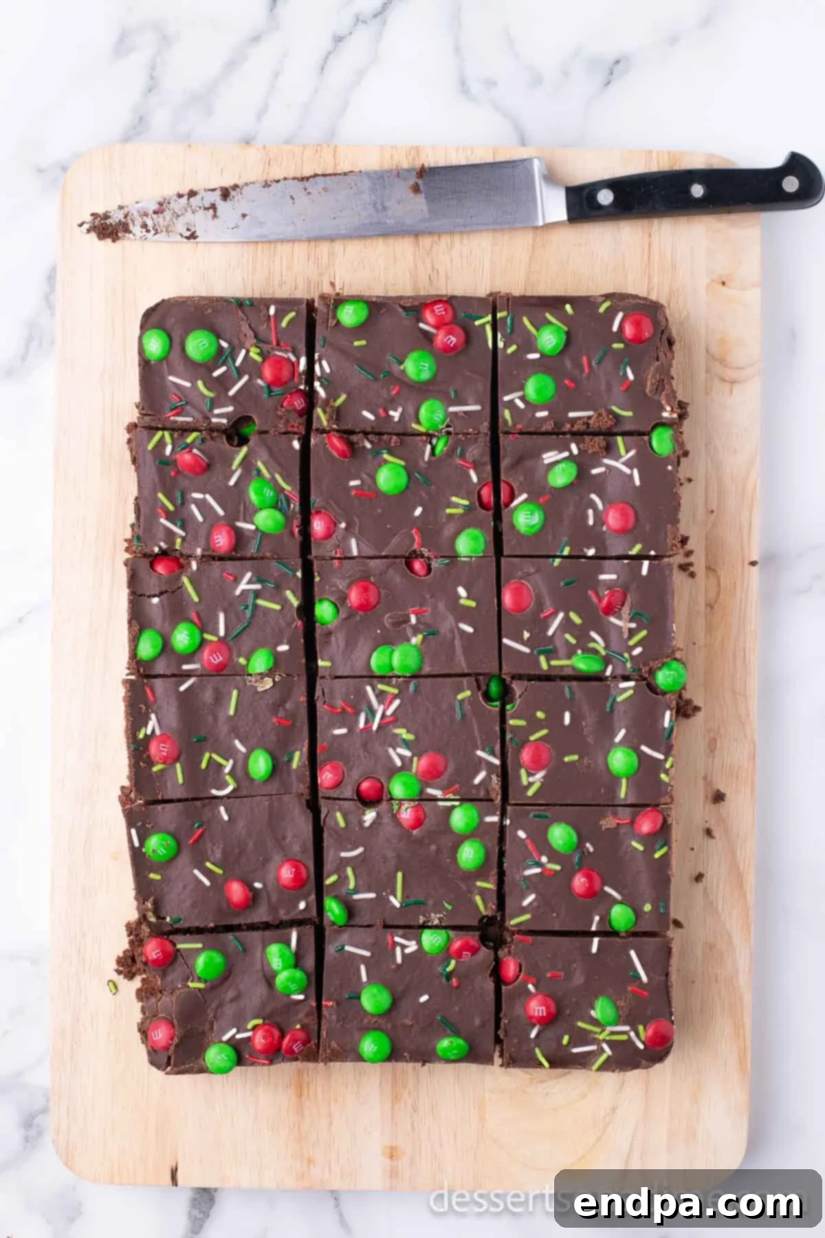 Merry & Bright Brownies 12 Cooling brownies cut into squares, ready for serving.