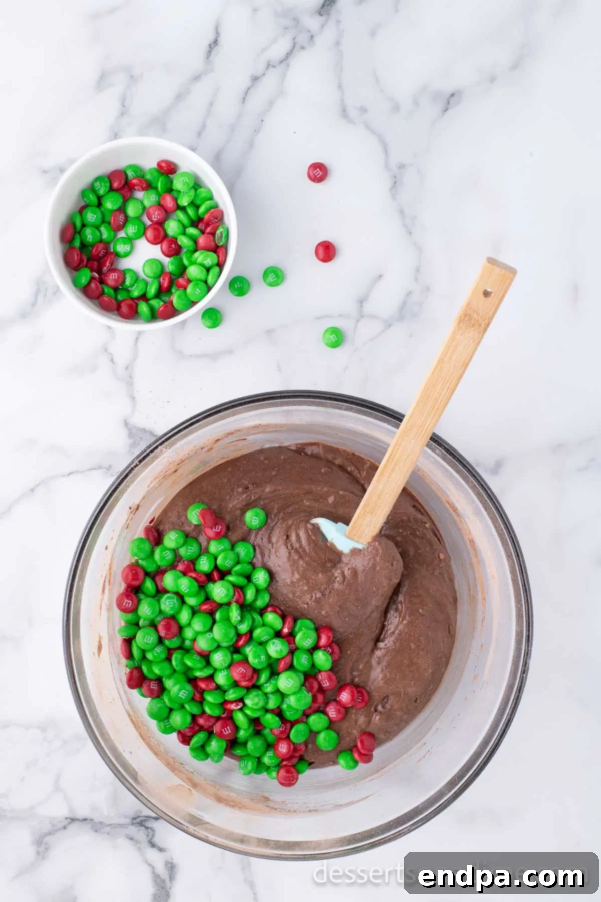 Merry & Bright Brownies 6 Brownie batter with colorful candy added to the mixture.