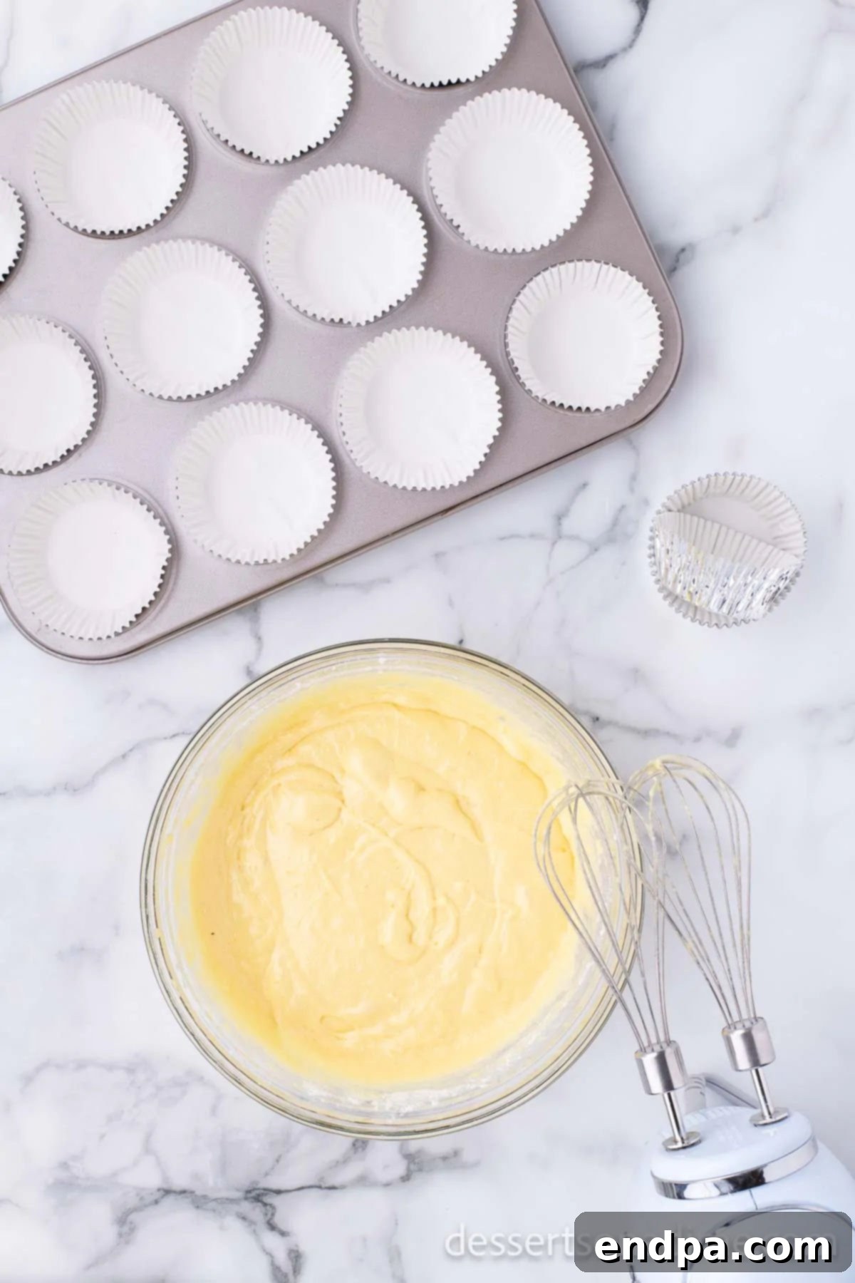 Cake batter in bowl mixed together. 
