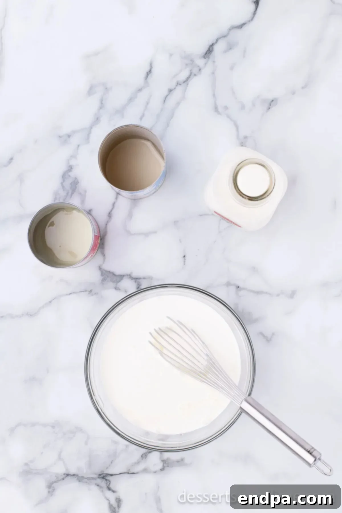 Milk combined in a bowl. 