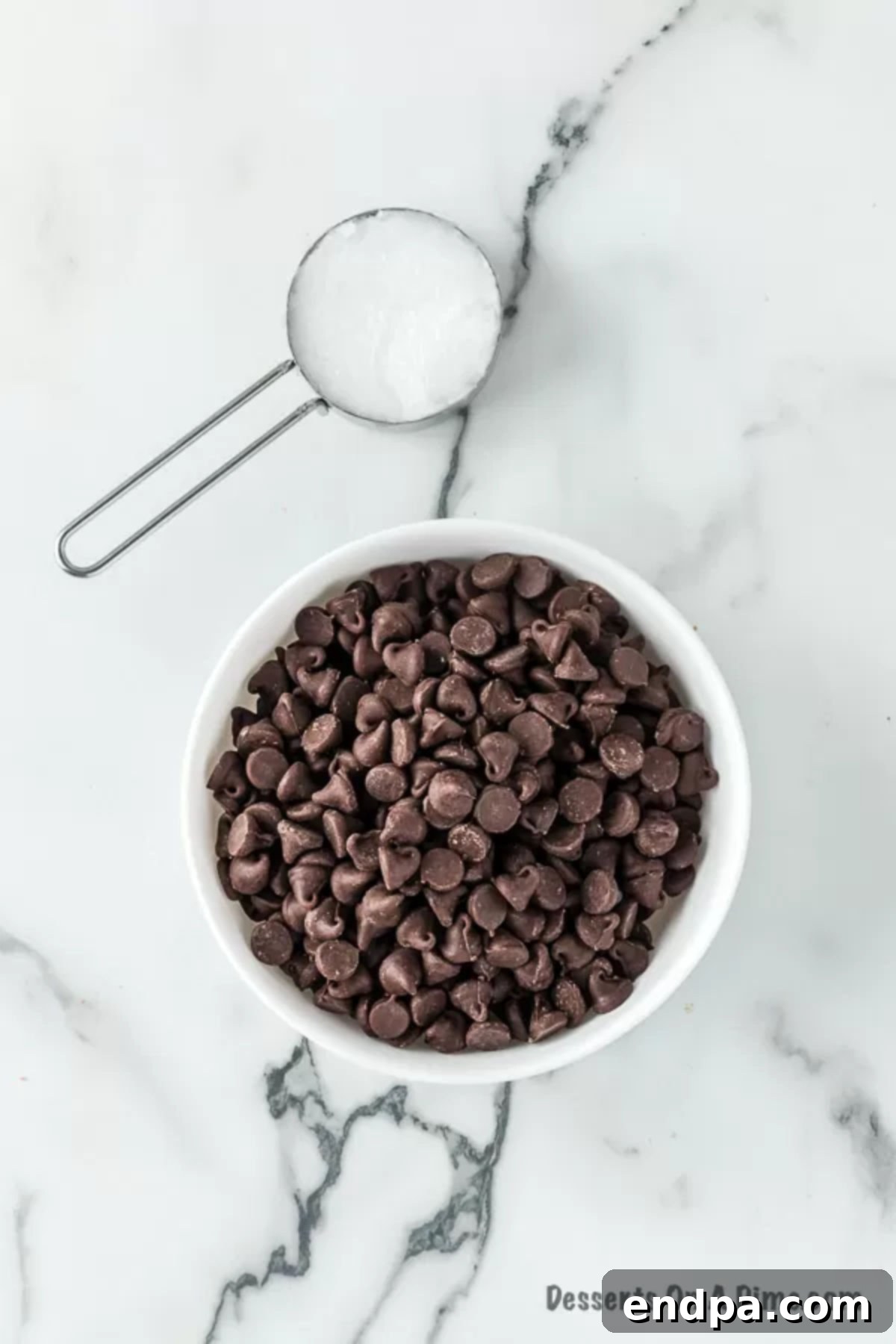 Homemade Hardening Chocolate Topping 3 Ingredients needed for homemade magic shell - chocolate chips and coconut oil.