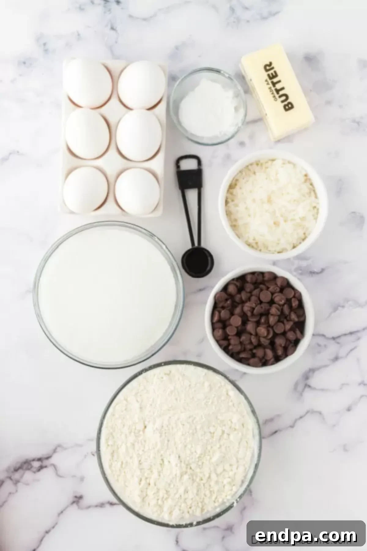 Chewy Coconut Chocolate Chip Dreams 3 Ingredients for coconut chocolate chip cookies - salted butter, eggs, vanilla, baking soda, flour, semi-sweet chocolate chips, shredded coconut, granulated sugar, baking powder.