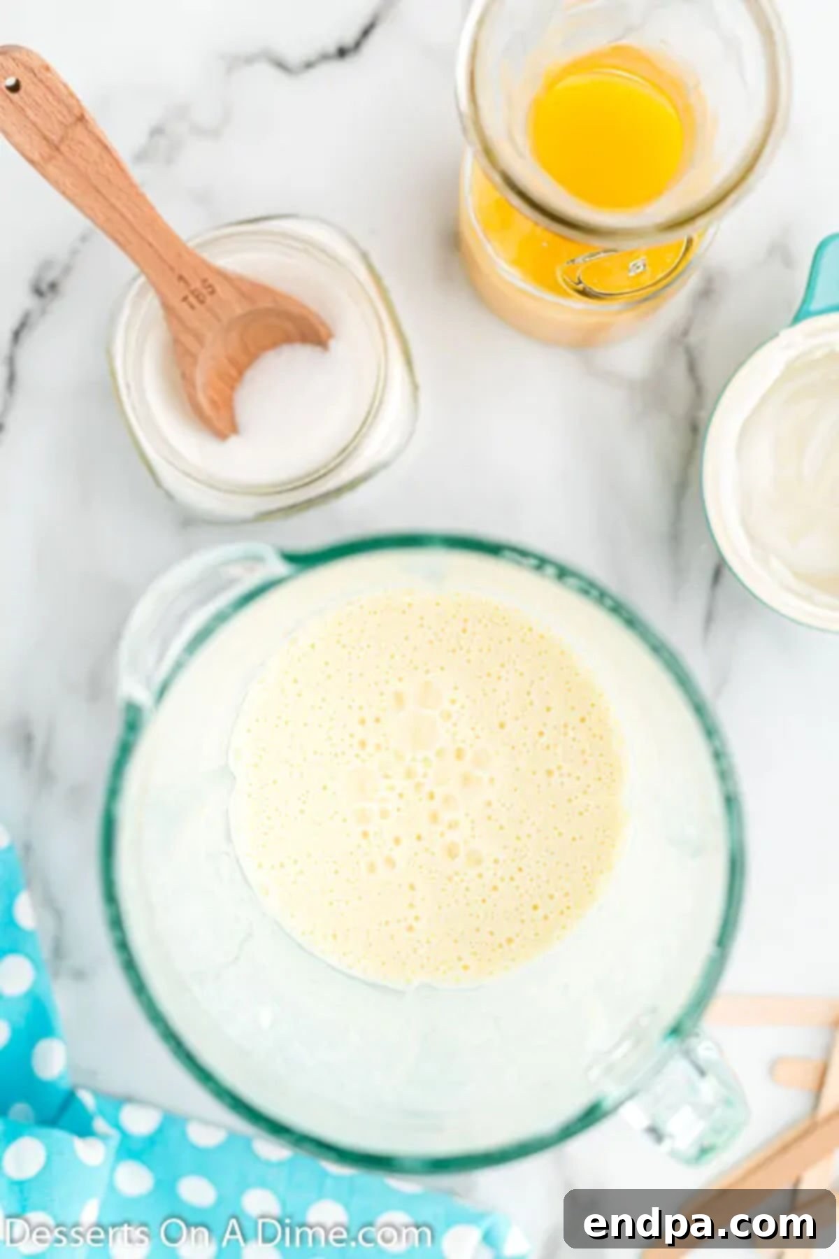 Orange Vanilla Swirl Pop 5 Ingredients blended together.