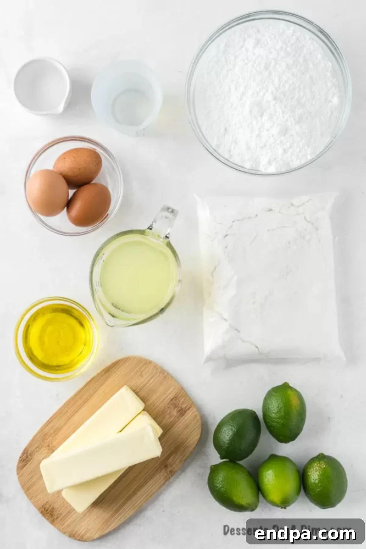 Ingredients for margarita cake including white cake mix, non-alcoholic margarita mix, lime zest, oil, eggs, and fresh lime juice.