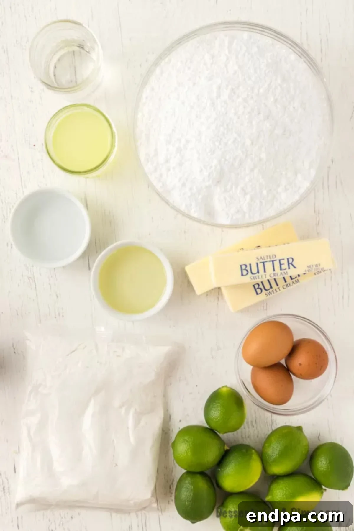 Tequila Lime Cupcakes 3 Ingredients needed - white cake mix, margarita mix, water, oil, lime zest, egg whites, butter, tequila, lime juice, powdered sugar,