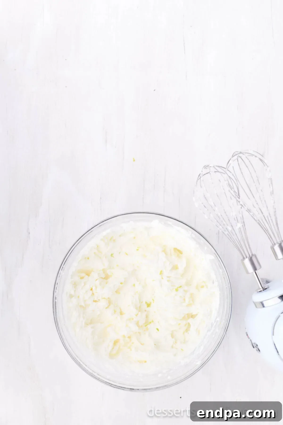 Tequila Lime Cupcakes 8 Sugar gradually added into mixture to make frosting.