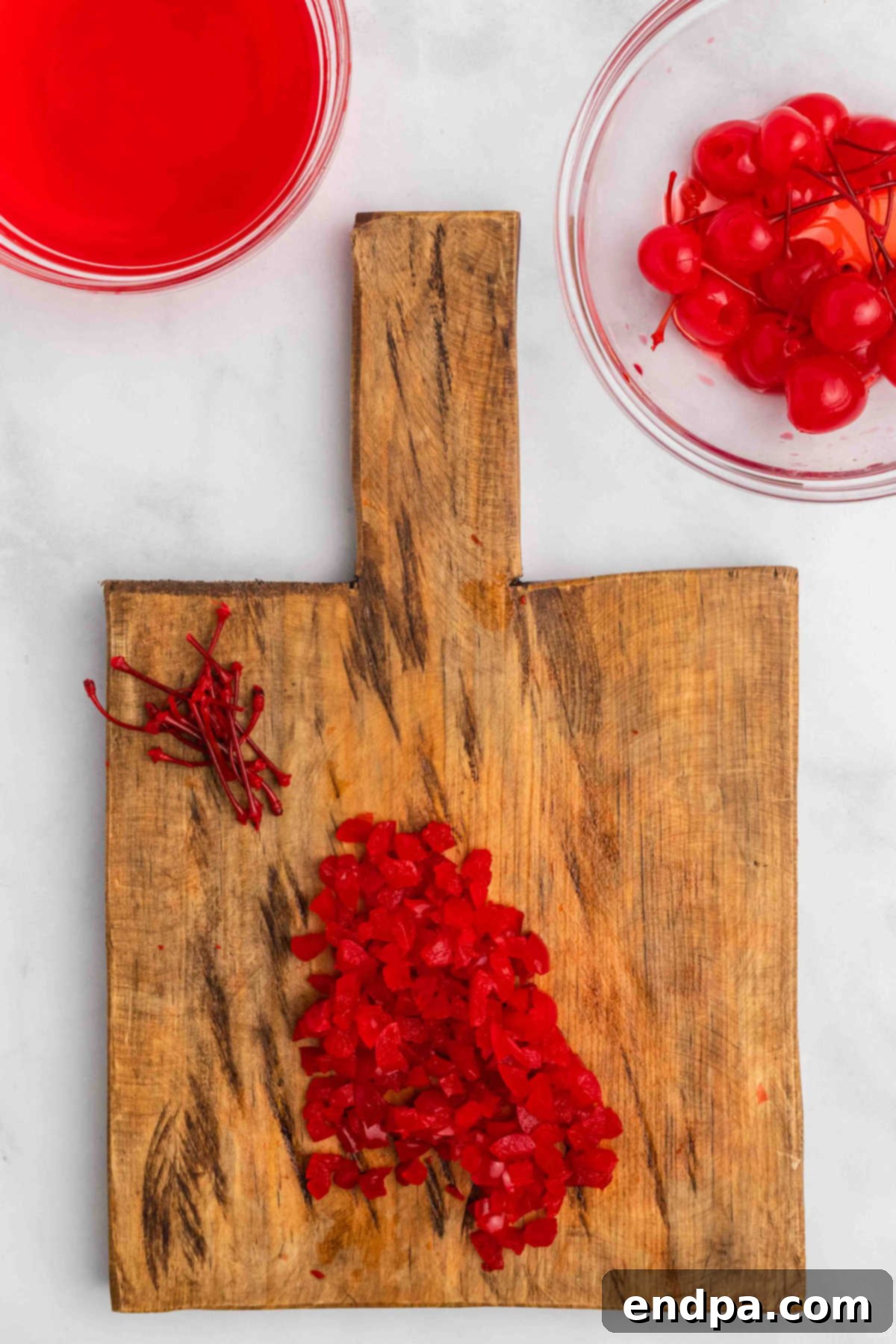 Cutting board with cherries.