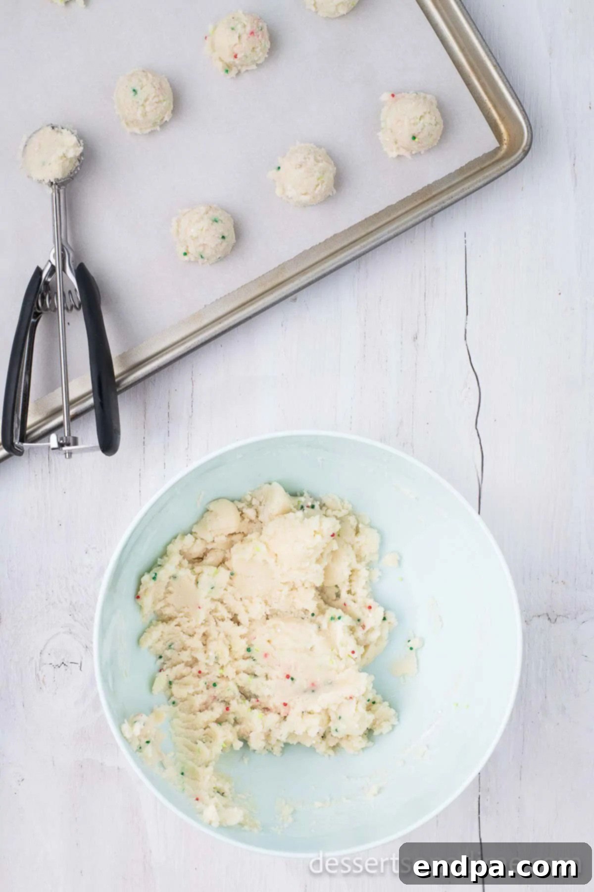 Forming cake balls out of the mixture. 