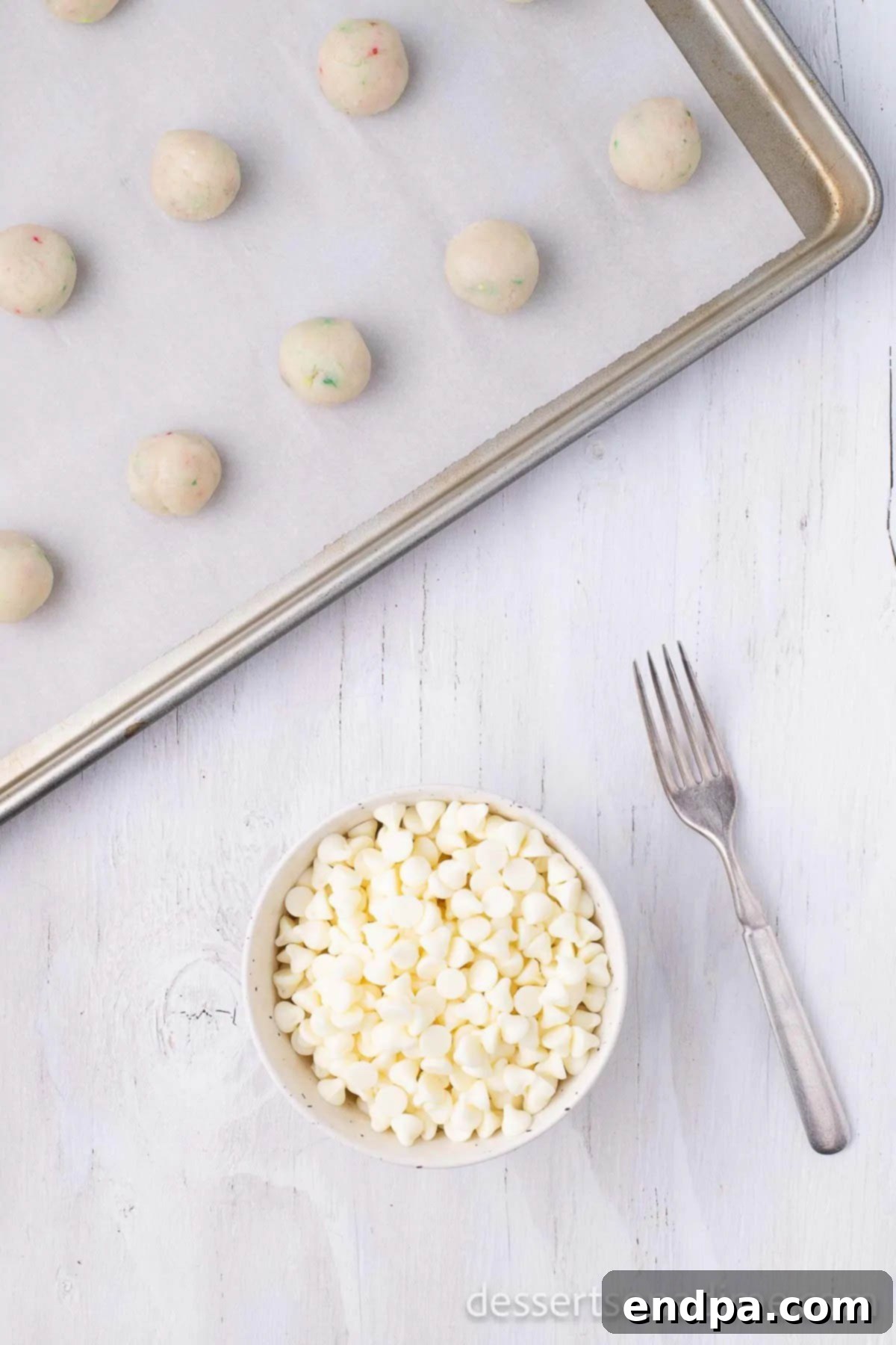 Cake balls on baking sheet. 