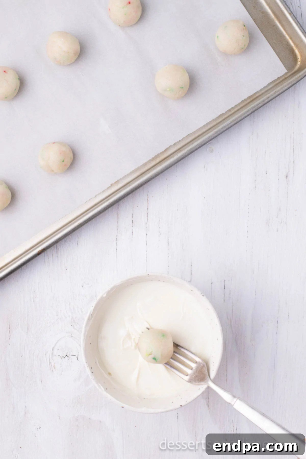 Balls dipped in melted chocolate. 