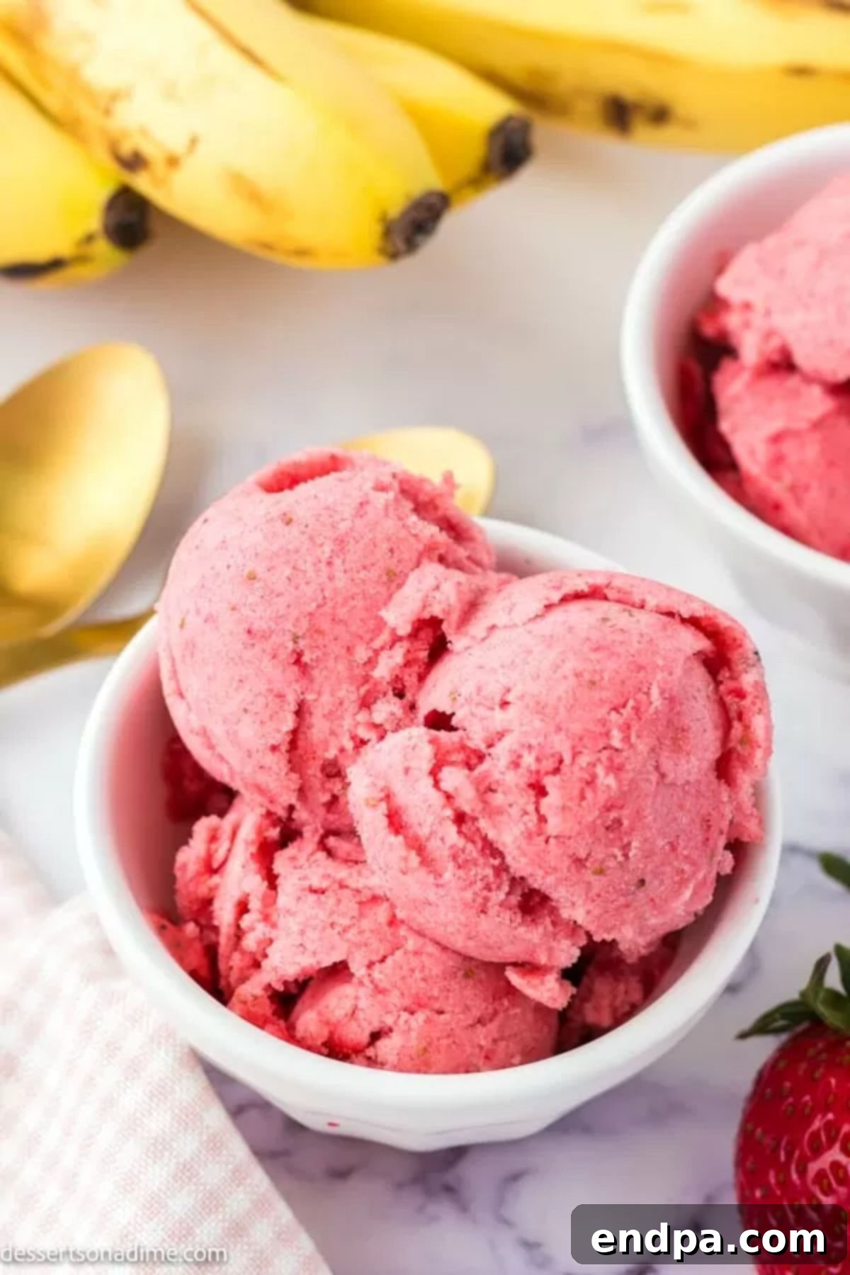 Fruity Frozen Delights 2 A vibrant bowl of homemade fruit ice cream, showcasing its creamy texture and fresh appeal.