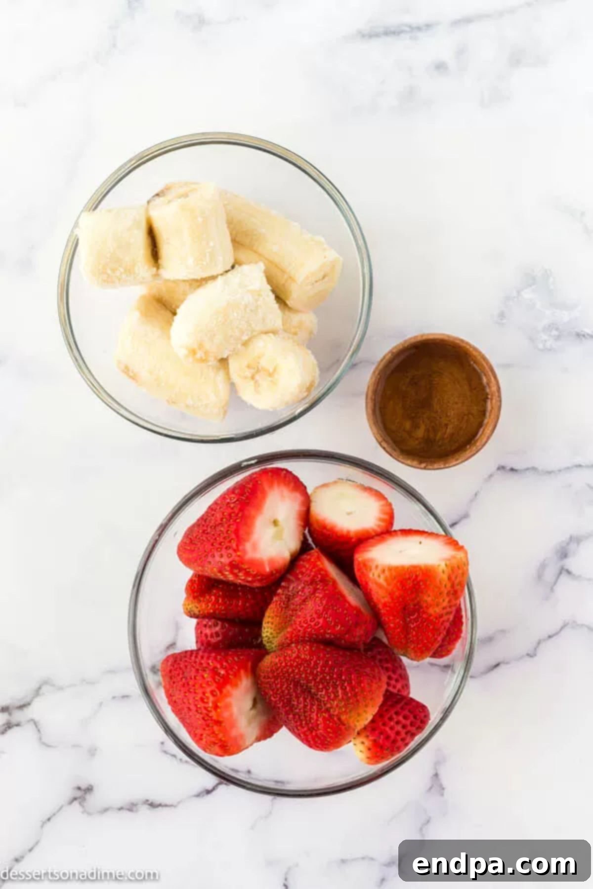 Fruity Frozen Delights 3 The simple ingredients for fruit ice cream: a selection of frozen fruit and a ripe banana, ready for blending.