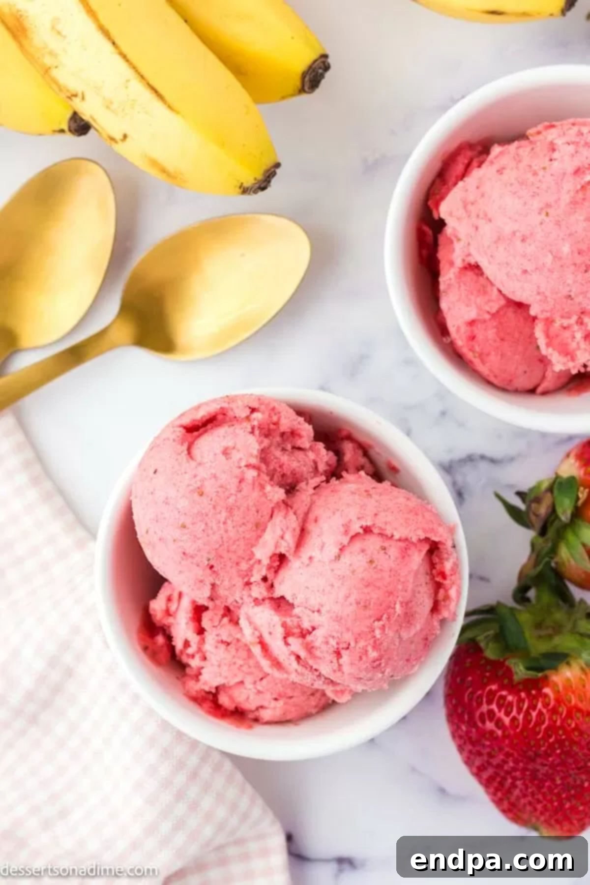 Fruity Frozen Delights 8 A close-up shot of a bowl of fruit ice cream, showing its smooth texture and vibrant color, ready to be enjoyed.