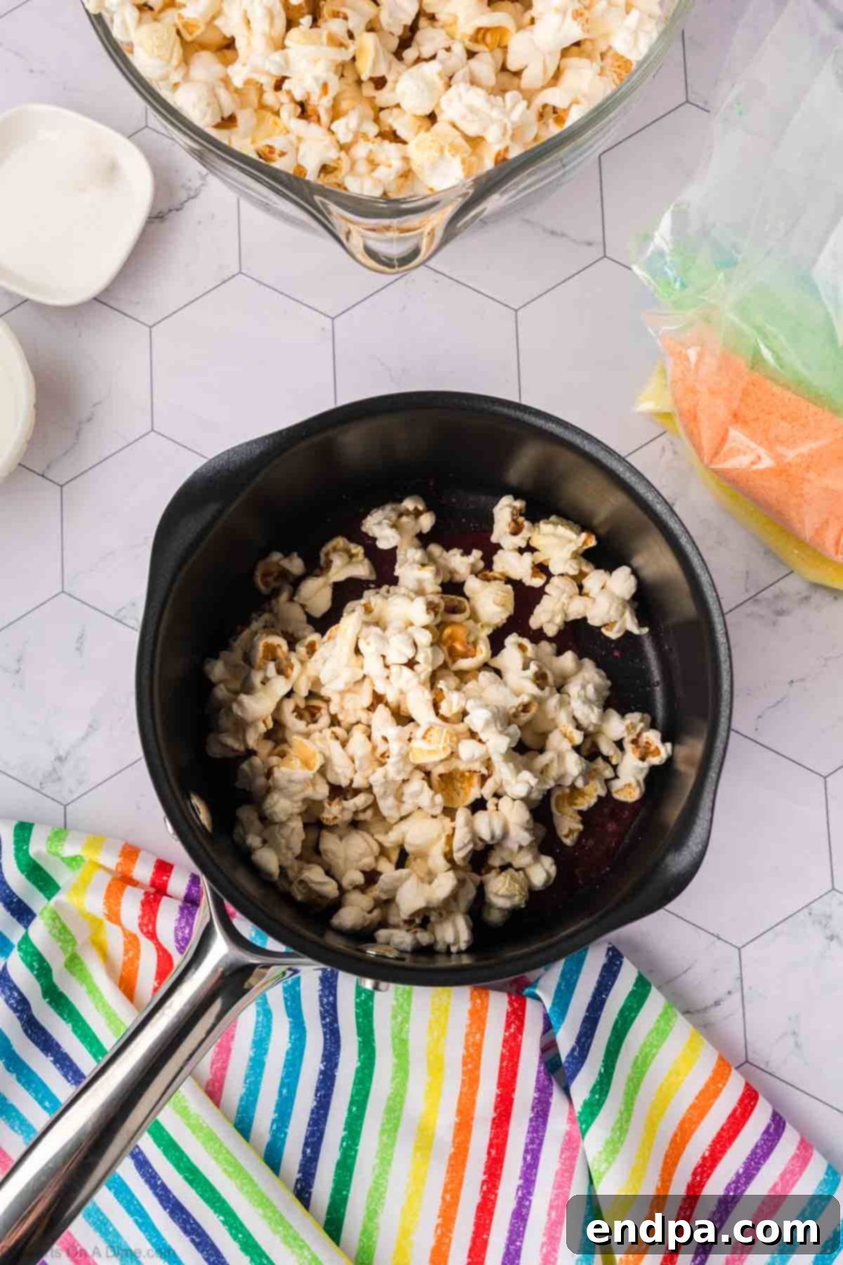 Kaleidoscope Kernels 10 Popcorn in a saucepan.