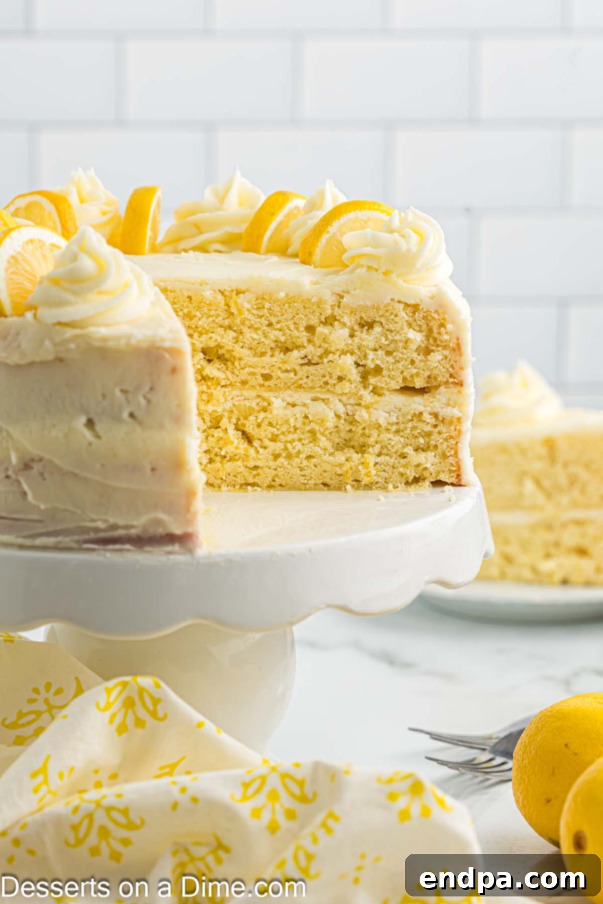 Sunshine Lemon Cake 11 Another view of the lemon cake being sliced, emphasizing its perfect texture.