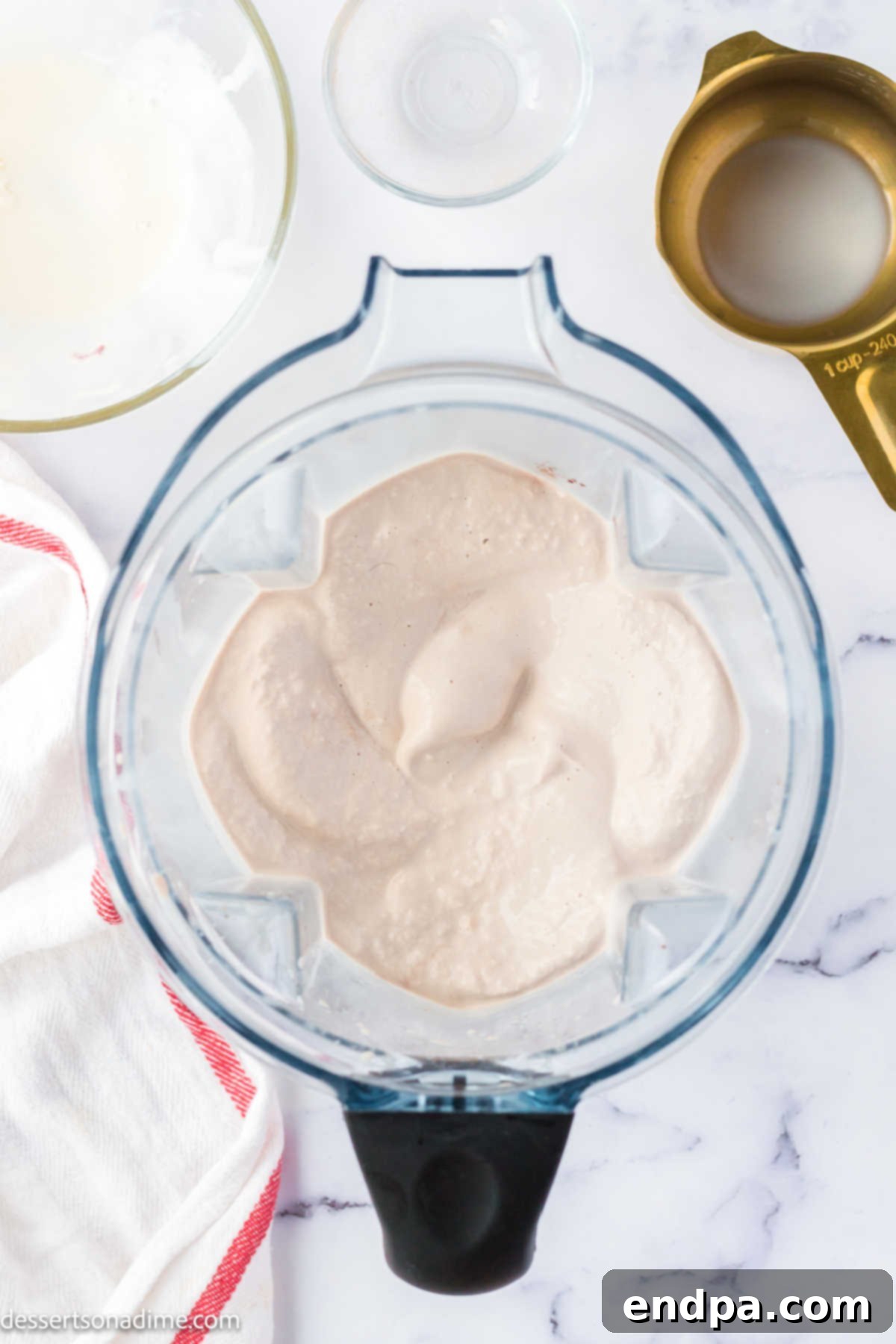 Crafting Your Own Wendy Frosty 5 The blended Wendy's Frosty mixture, showing a smooth, thick consistency inside the blender.