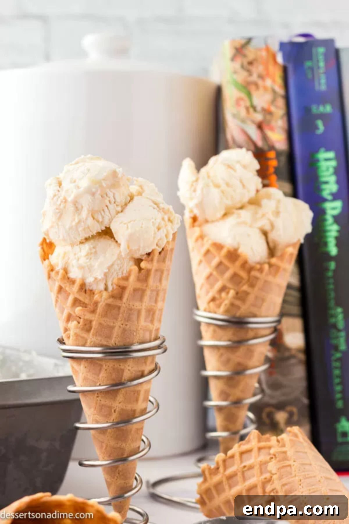 Creamy Butterbeer ice cream, a magical Harry Potter-inspired treat, served in a classic sugar cone, inviting a taste of the wizarding world.