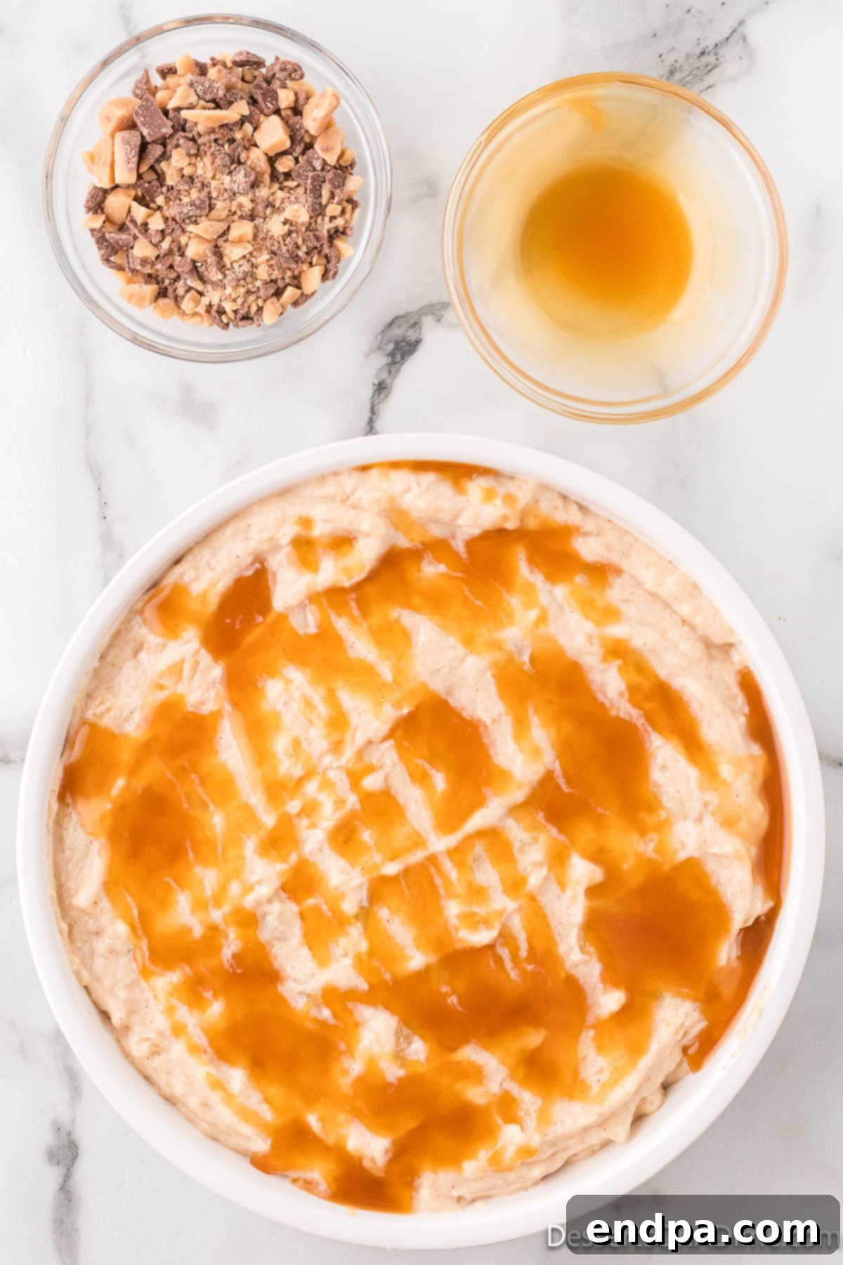 Caramel sauce drizzled artfully over the chilled dip.