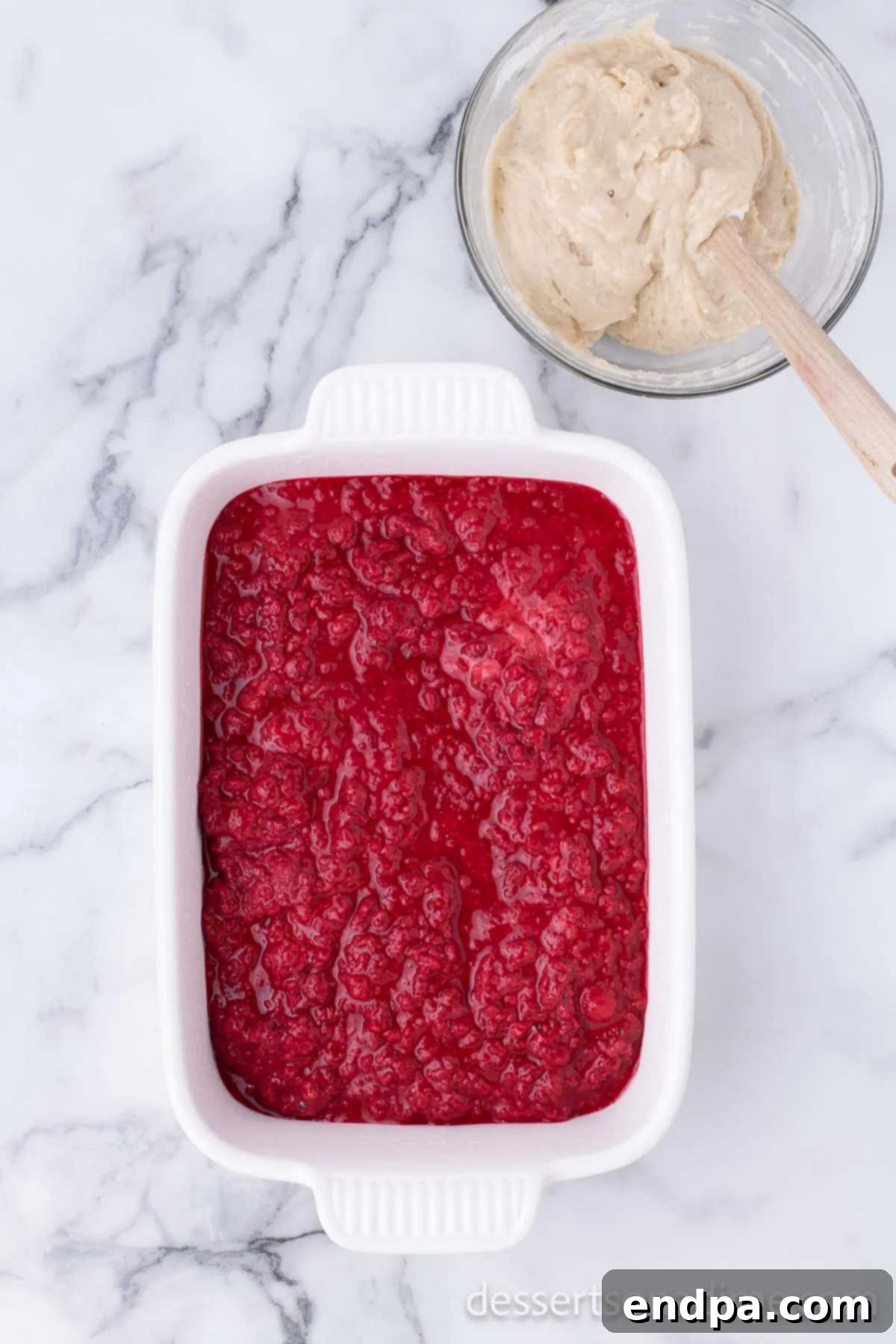 Mixture spread evenly in a baking dish.