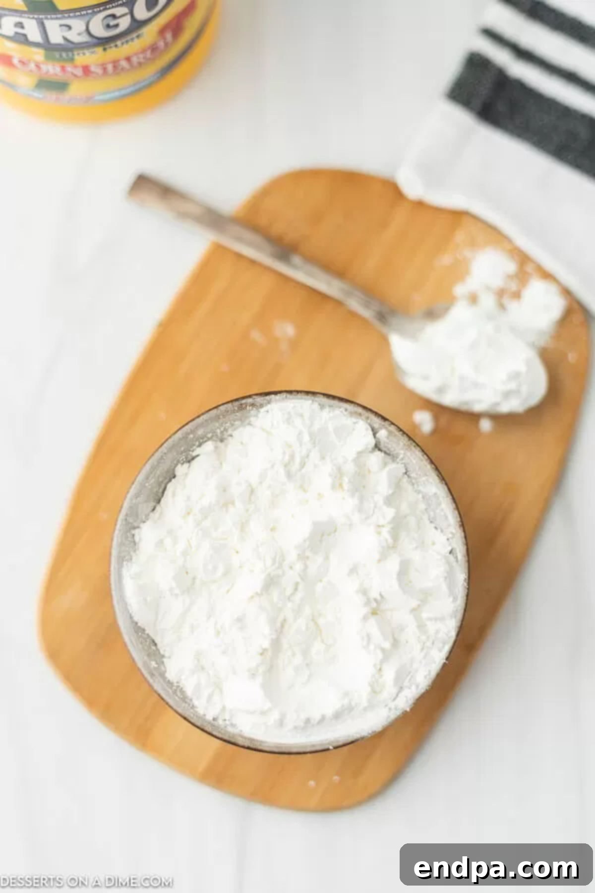 Cornstarch in a bowl, ready for use or substitution. 