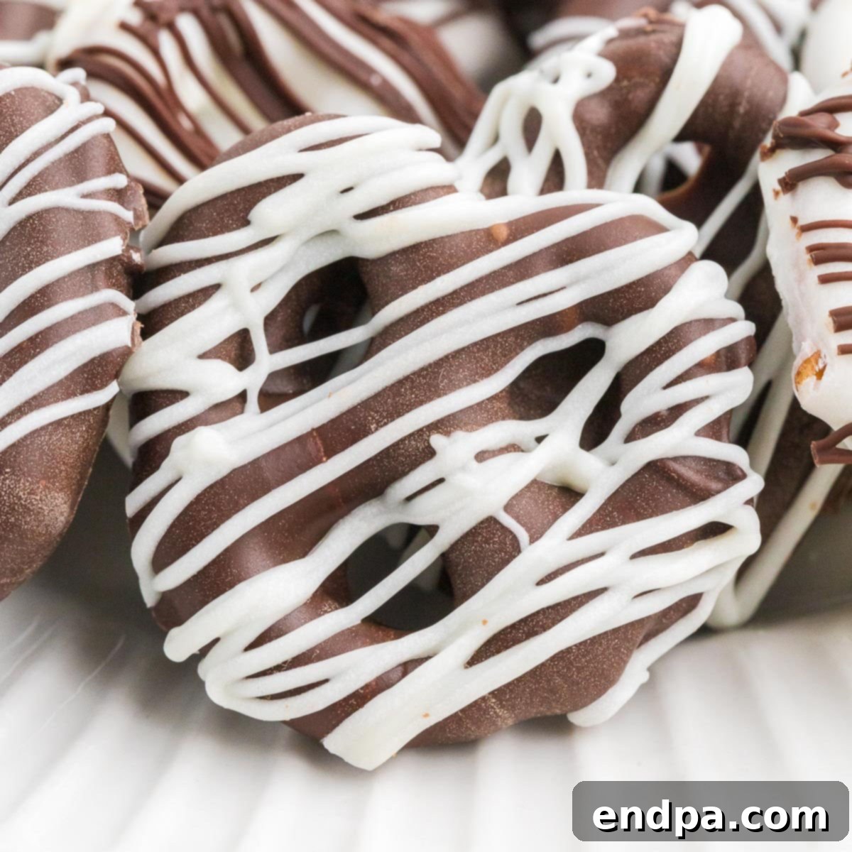 A beautifully presented serving of homemade chocolate covered pretzels.