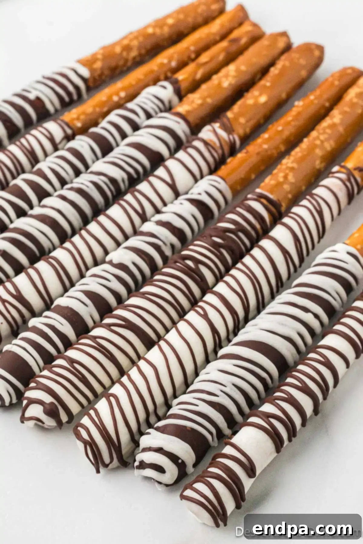 Pretzels coated in chocolate ready to enjoy.