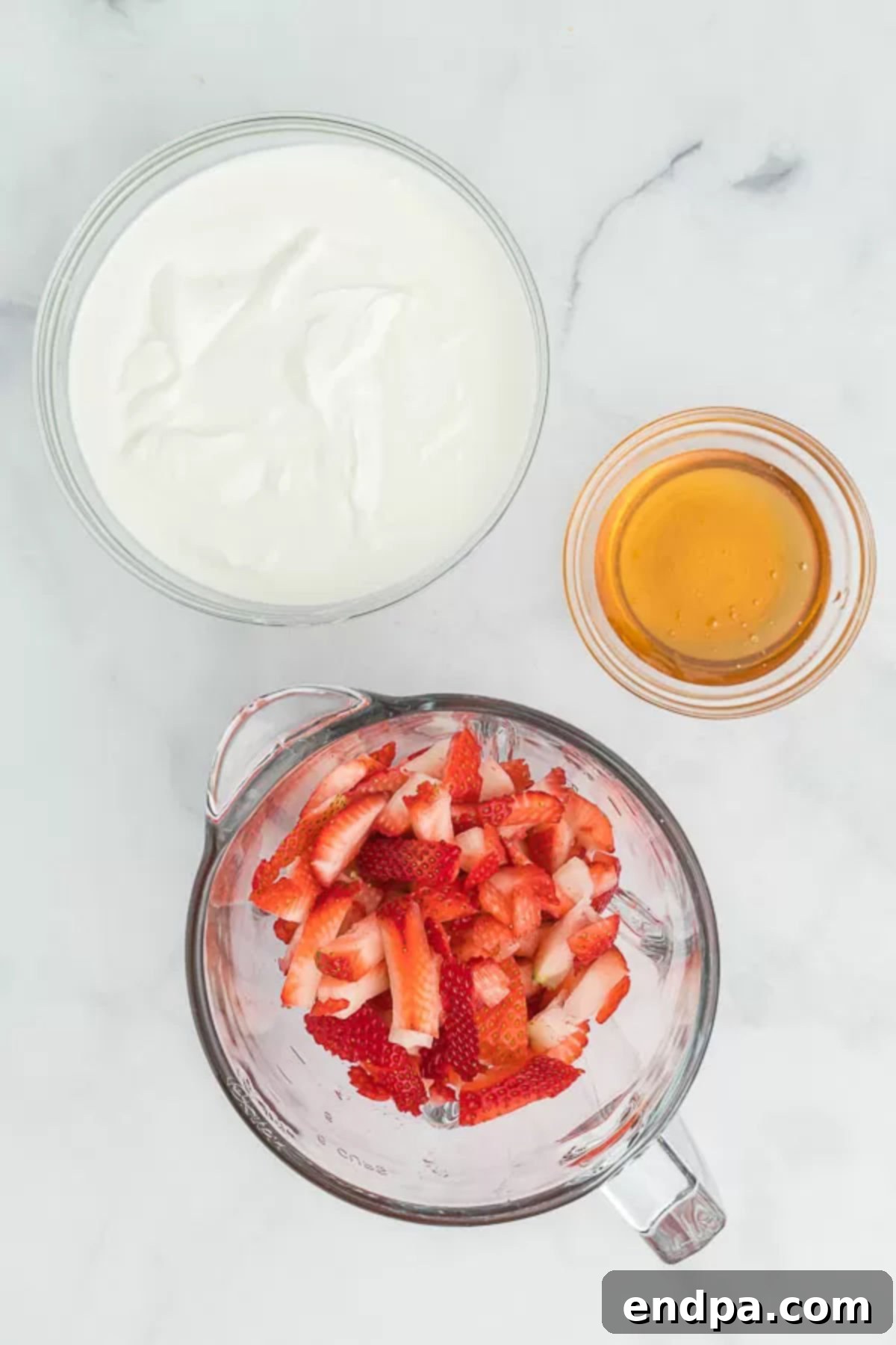 Berry Bliss Yogurt Pops 3 Ingredients for Strawberry yogurt popsicles - Greek Yogurt, strawberries, honey.