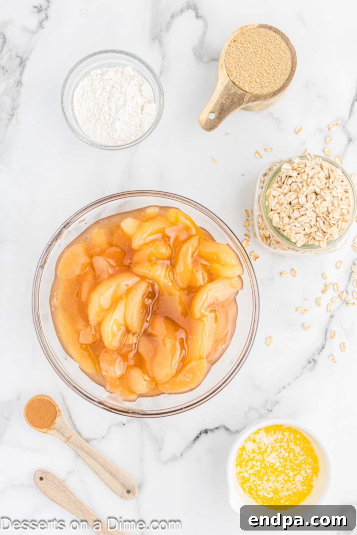Cozy Slow Cooker Apple Crisp 3 Ingredients for apple crisp - apple pie filling, brown sugar, flour, butter, cinnamon.