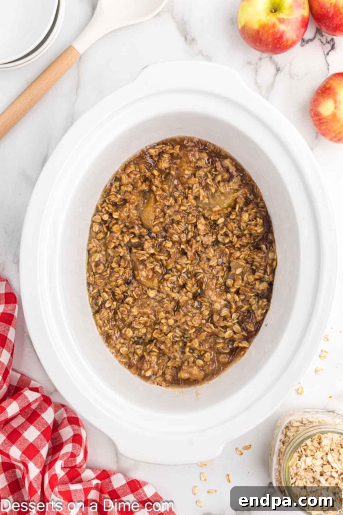Cozy Slow Cooker Apple Crisp 7 Crock Pot with apple crisp ready to enjoy.