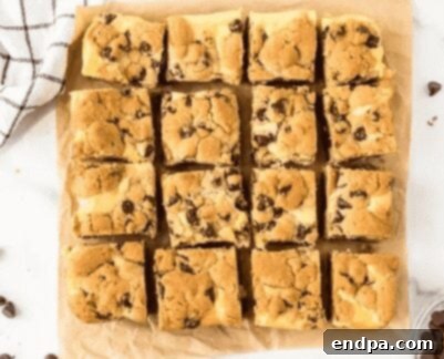 Chocolate Chip Cheesecake Bars cut into squares.