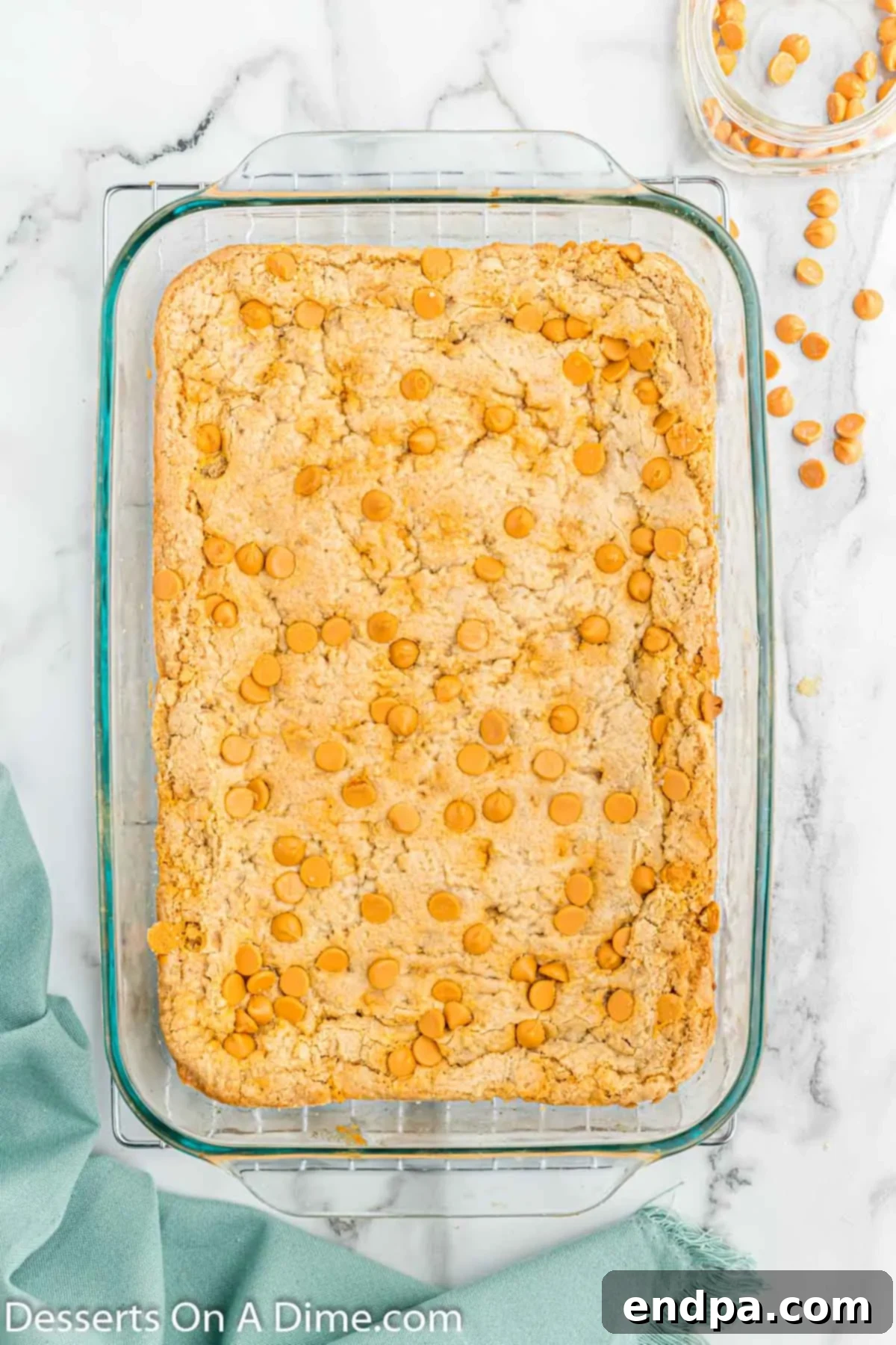 Irresistible Butterscotch Squares 10 Freshly baked butterscotch bars cooling in the pan on a wire rack.