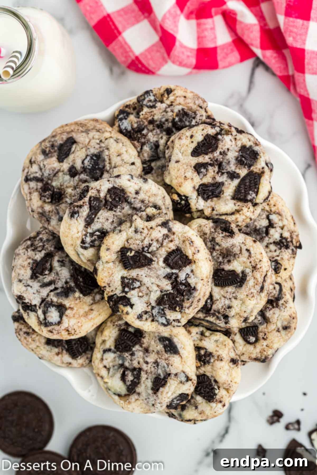 Oreo cheesecake cookies freshly baked on a platter, ready to be enjoyed.