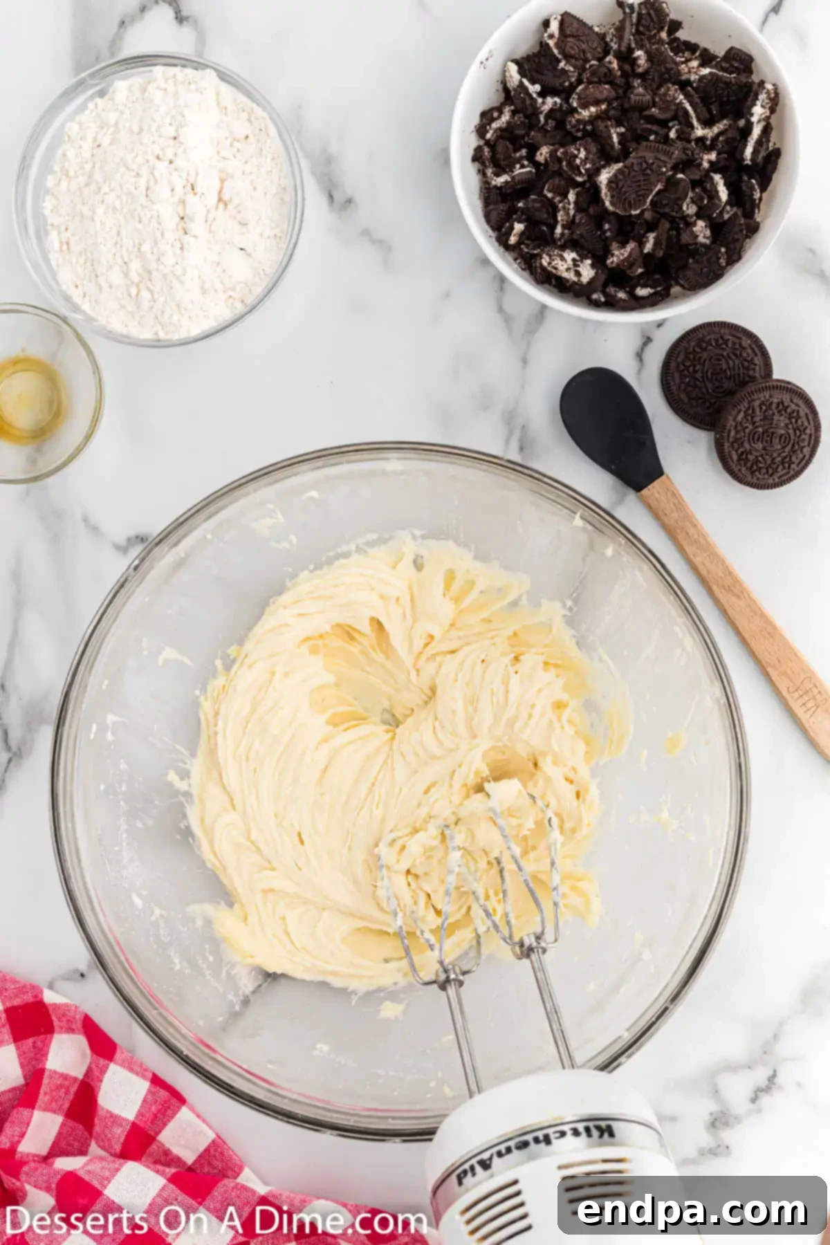 The smooth and creamy cookie dough mixture in a bowl, ready for dry ingredients.
