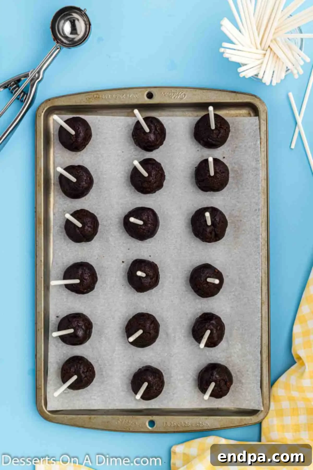 Brownies with cake pops stick inserted. 