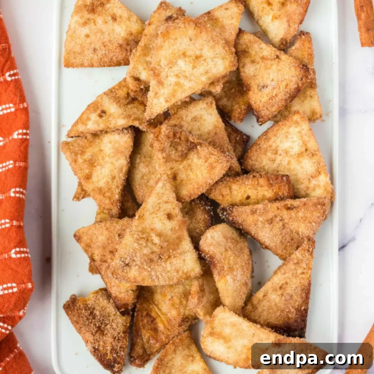 Air fryer churro chips on a platter. 