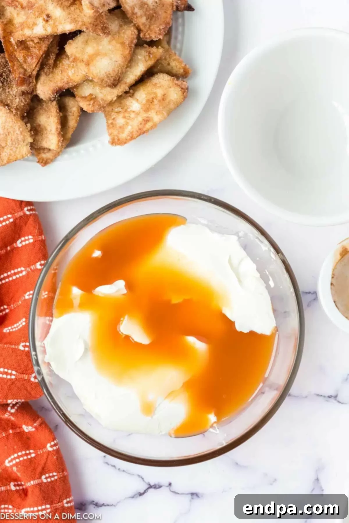 Rich Homemade Caramel Dip 4 Caramel sauce poured over cream cheese.