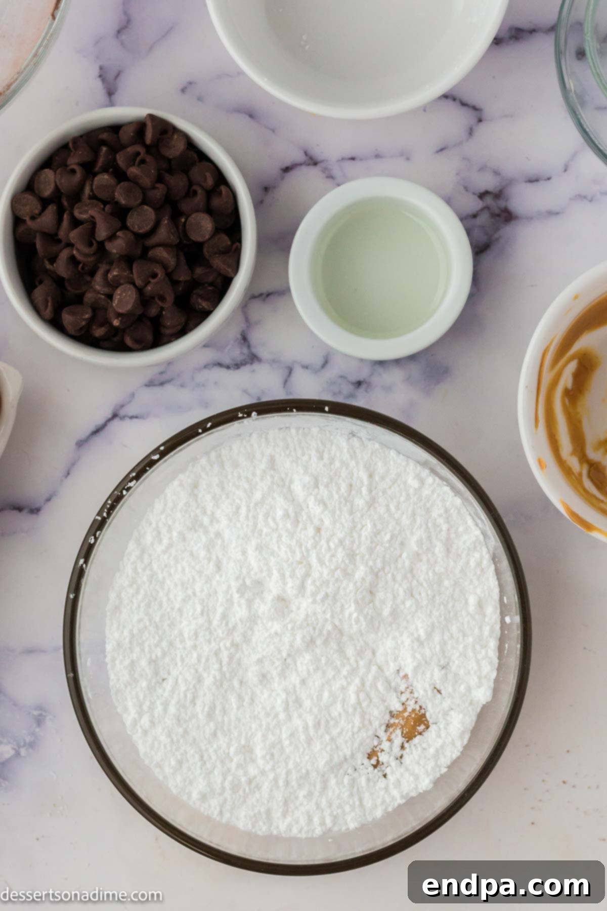 Ultimate Buckeye Brownie Delights 6 A bowl containing the creamy peanut butter and powdered sugar mixture, ready to be formed into balls.