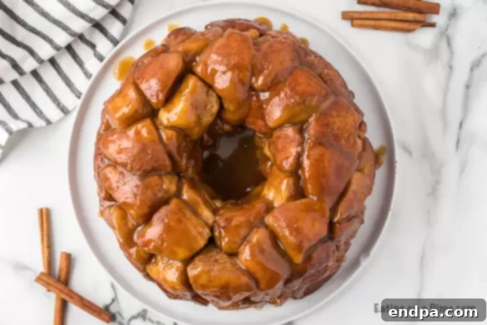 Warm and gooey Easy Monkey Bread, pulled apart to reveal its cinnamon sugar layers.