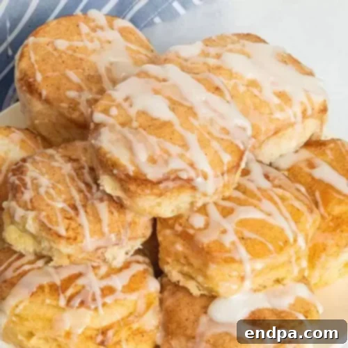 Warm Lazy Day Cinnamon Biscuits with a sweet glaze drizzle.