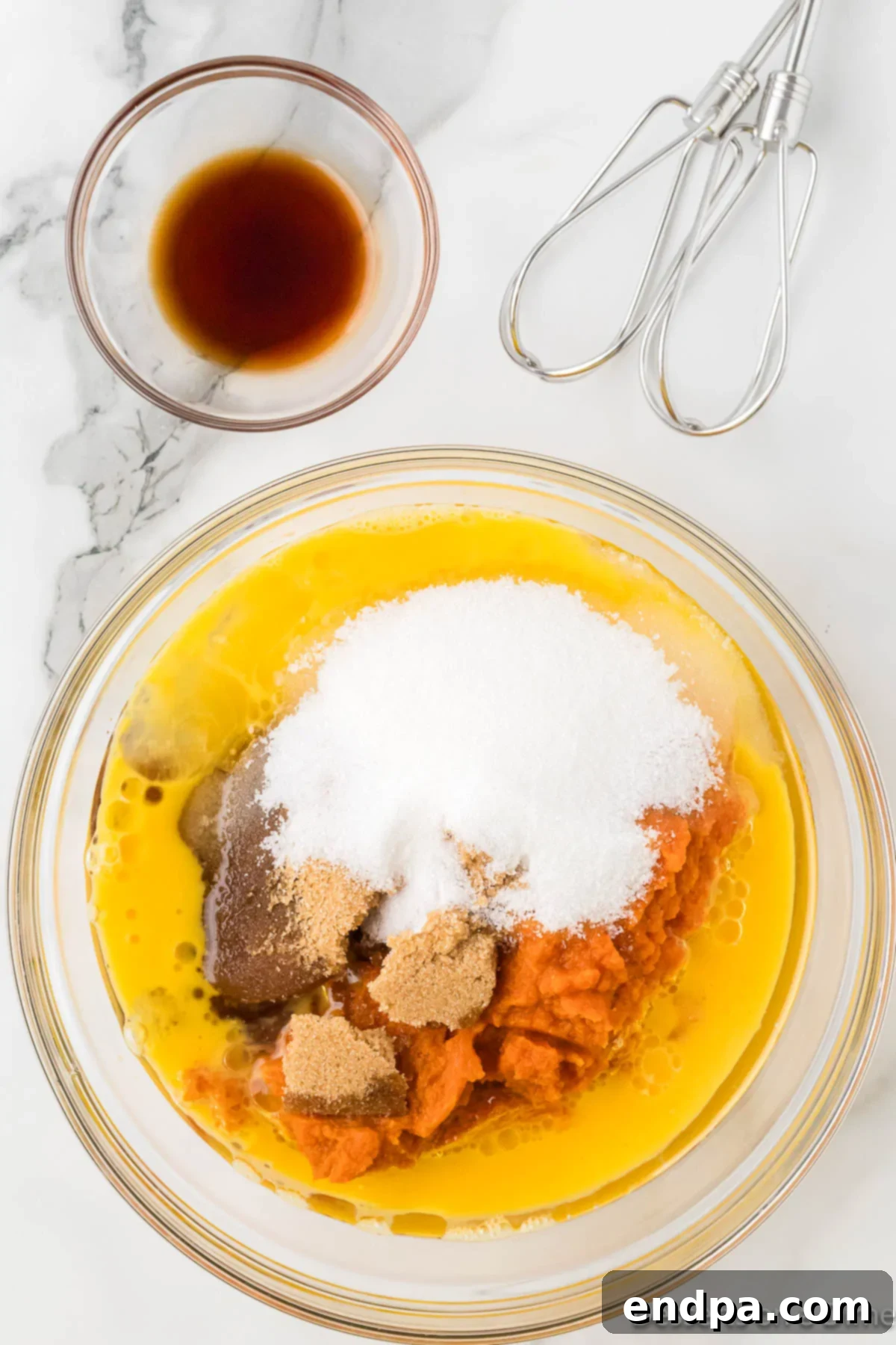 Starbucks Copycat Pumpkin Bread 5 Wet ingredients combined in a separate bowl.