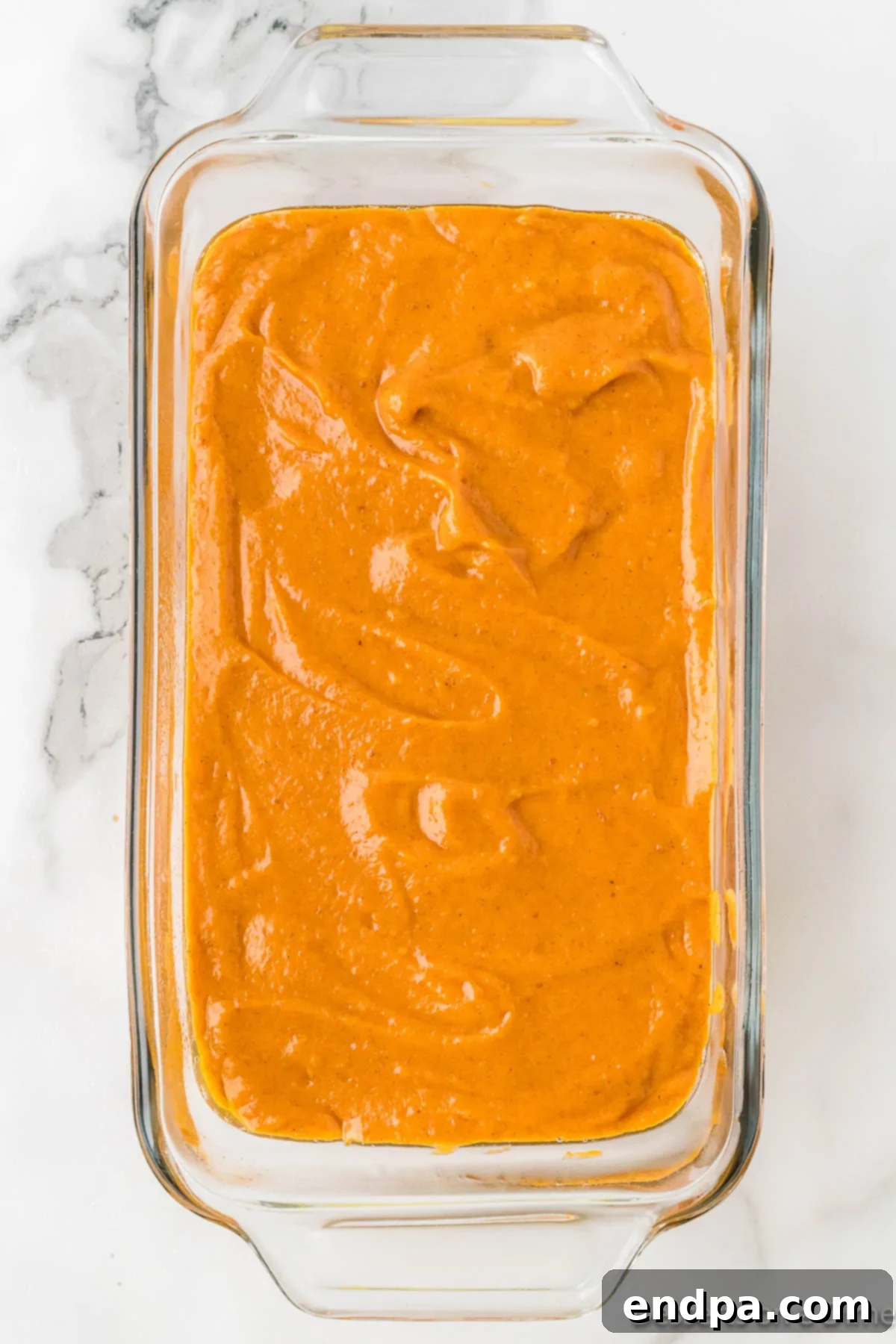 Starbucks Copycat Pumpkin Bread 7 Batter poured into loaf pan.