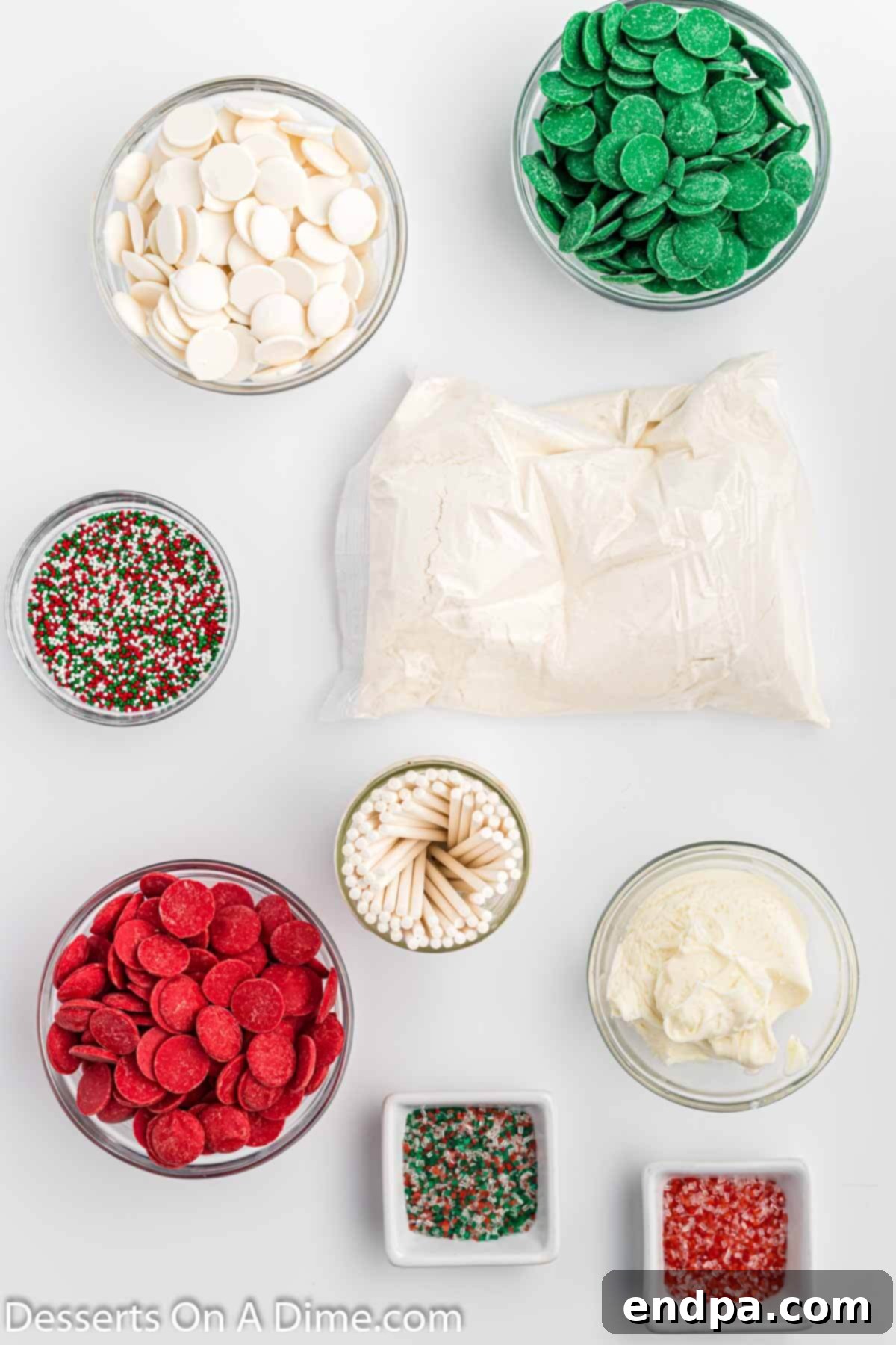 Ingredients for Christmas Cake pops: yellow cake mix, cream cheese frosting, candy melts, lollipop sticks, and sprinkles.