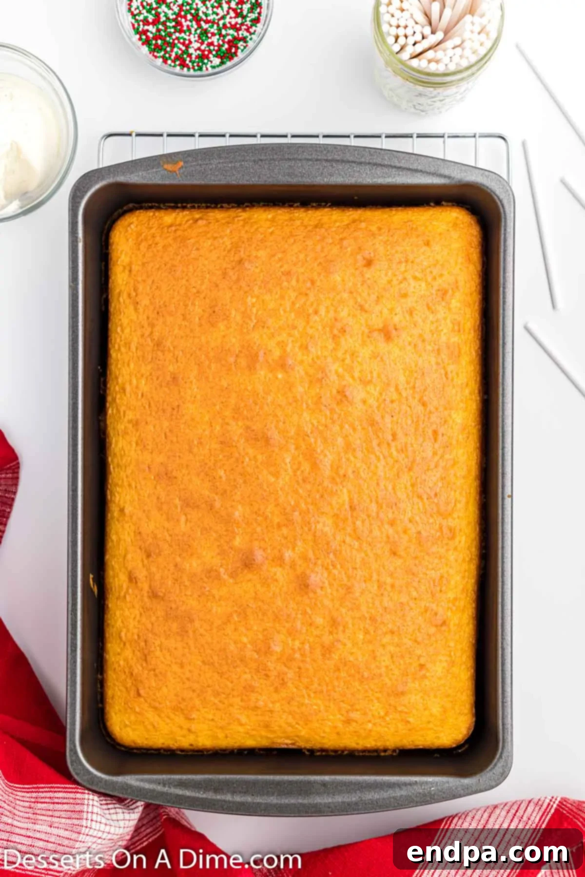 Baked cake in a pan, ready for crumbling.